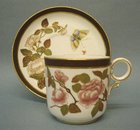 A Royal Worcester Coffee Cup and Saucer