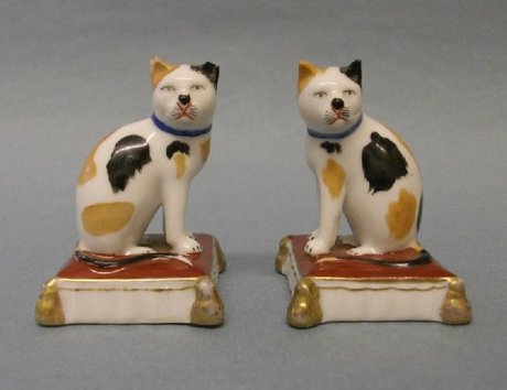 A Pair of Porcelain Cats - Attributed to Rockingham