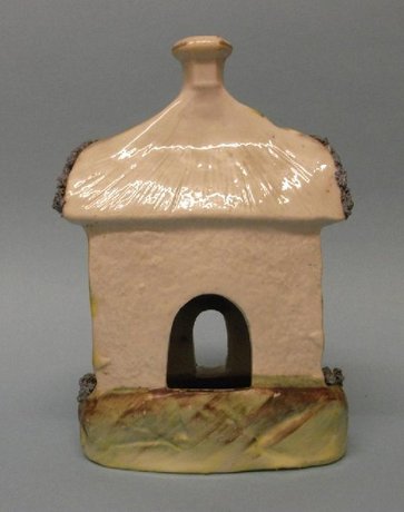 A Porcelain Cottage Shape Pastille Burner