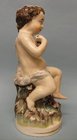 A Staffordshire Figure of Bacchus as a Boy