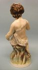 A Staffordshire Figure of Bacchus as a Boy
