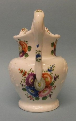 A Delightful, Small, Moulded Jug by John and Richard Riley