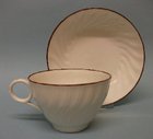 A Spiral Fluted Tea Cup and Saucer
