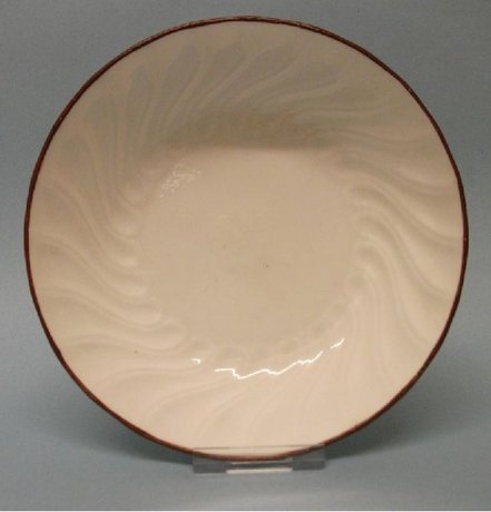 A Spiral Fluted Tea Cup and Saucer