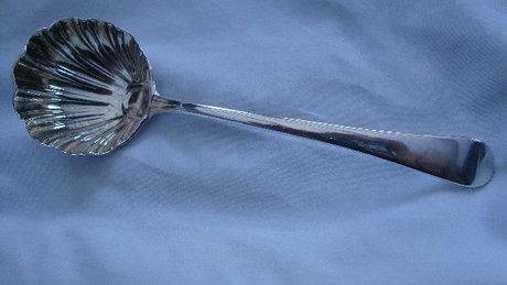 A fine silver fruit spoon by Paul Callard