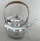 A Silver Plated Tea Pot by Dr Christopher Dresser Hukin & Heath