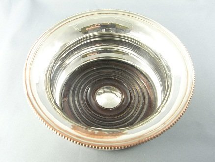 A PAIR OF SILVER PLATED COASTERS