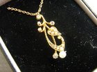 EDWARDIAN PEARL AND DIAMOND PENDANT AND CHAIN