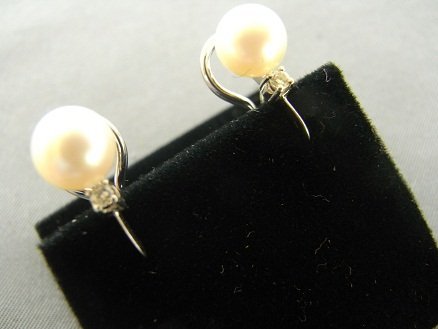 PAIR OF PEARL AND DIAMOND CLIP EARRINGS