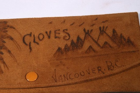 A Native American leather suede glove case