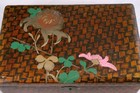 A 20th century Japanese lacquered and floral decorated rectangular lidded box