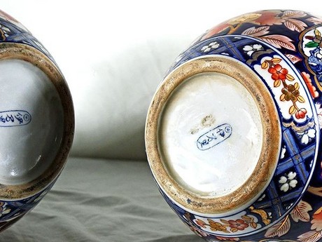 A matching pair of late 19th century Chinese bottle neck porcelain vases