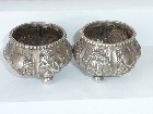 ANTIQUE PAIR CHINESE SILVER SALTS FIGURES BUILDINGS FOLIAGE - SIGNED TO BASE 