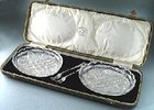 BOXED PAIR CUT CRYSTAL PICKLE DISHES & SILVER FORKS