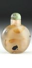 CHINESE CARVED AGATE SNUFF BOTTLE WITH JADE STOPPER