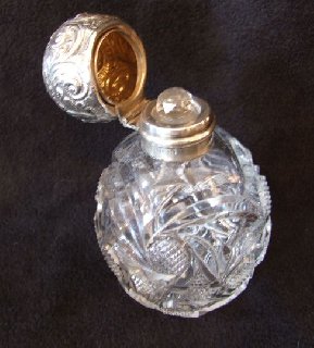 cut glass and silver antique perfume bottle