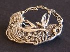 Solid silver art nouveau brooch of a maiden