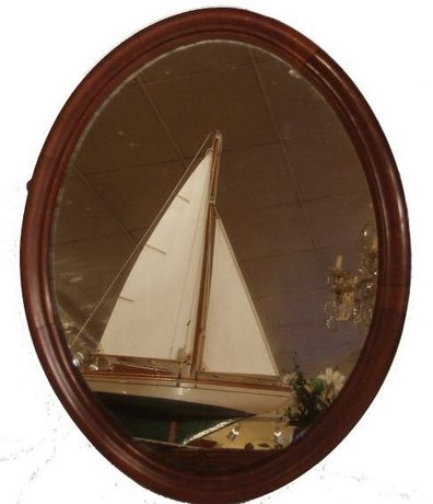 Victorian oval mahogany wall mirror