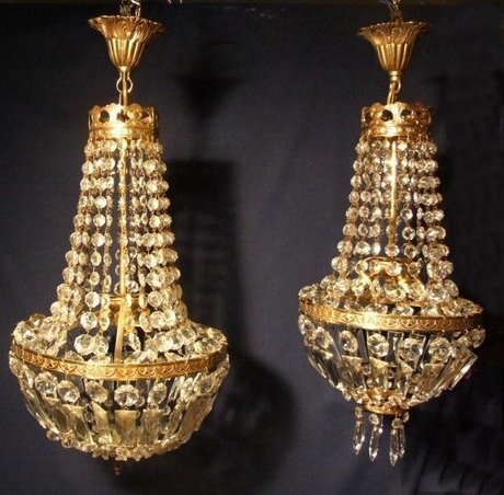 Near matching pair of antique French Empire style chandeliers