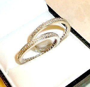 A Pair of Diamond White Gold Full Eternity Rings