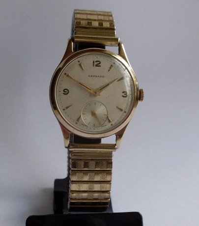 Garrard gold wristwatch. De Havilland Aircraft company.