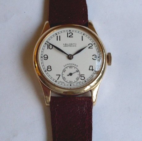 Longines. A & J Smith. Aberdeen. Men's gold wristwatch.