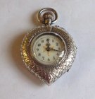 Edwardian heart shaped silver fob watch
