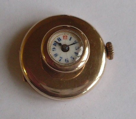 Gold button hole watch