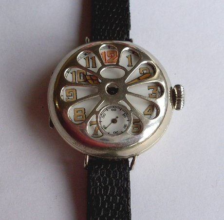 WW1 men's military wristwatch with integral guard.