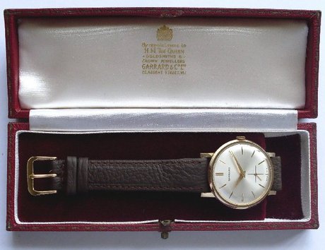 Garrard men's gold wristwatch with box