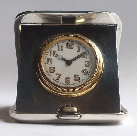 Silver cased folding travel clock