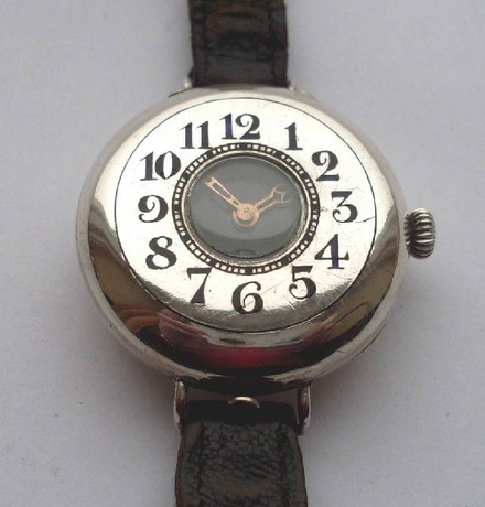 WW1 half hunter cased men's silver wristwatch.