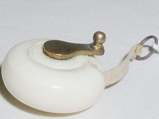Carved Ivory Tape Measure