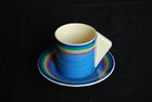 A Clarice Cliff coffee can & saucer