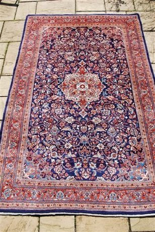 A Small Keshan Carpet