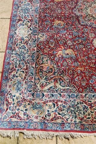A lovely Kirman Hunting carpet