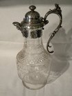 Engraved glass and silver metal claret jug