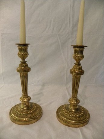 A pair of Ormalu Candlesticks