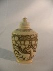 Oriental carved ivory snuff bottle