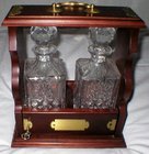 A Double Tantalus With Cut Glass Decanters
